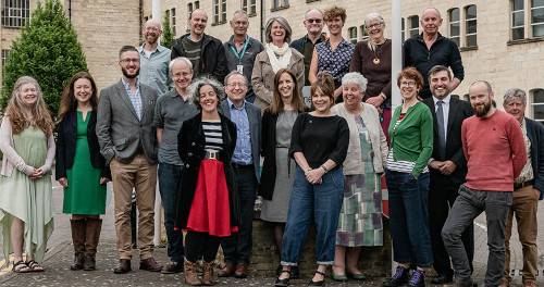 A very happy group of newly elected Green Party councillors.  Ebley Mill in the background.  Me at the back, just right of centre with tinted glasses.
